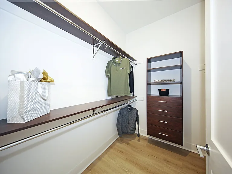 Walk-in Closets with Custom Cabinetry