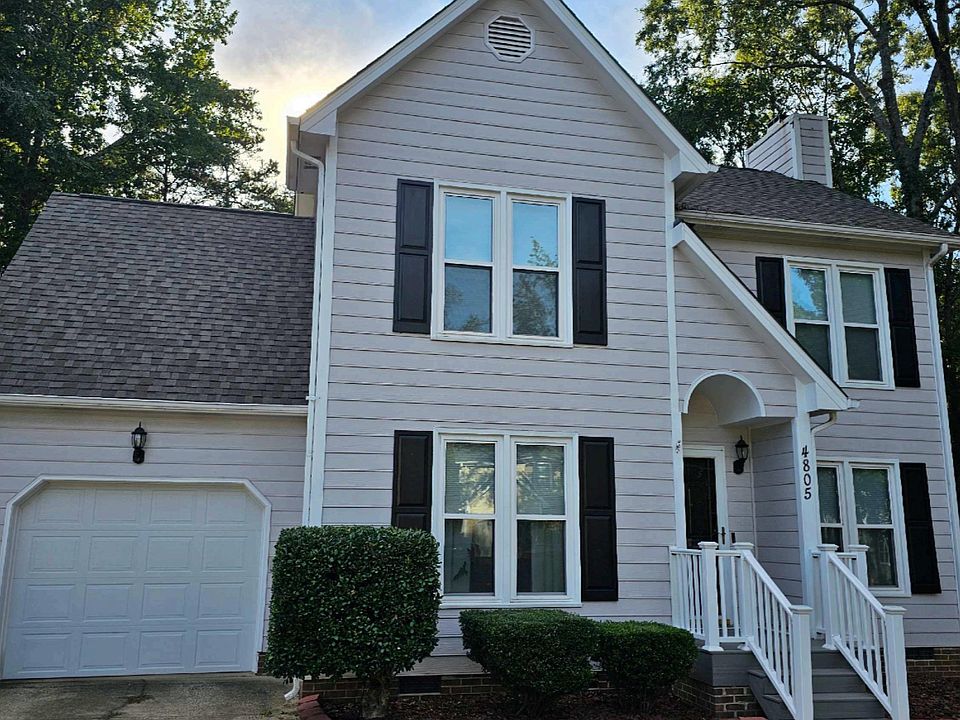 The front of the home offers inviting curb appeal with a welcoming entry and well-maintained exterior, setting the tone for the comfort and style found throughout the property.