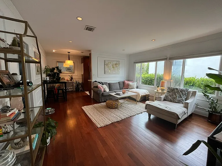 Large living room cherry wood through out the common areas