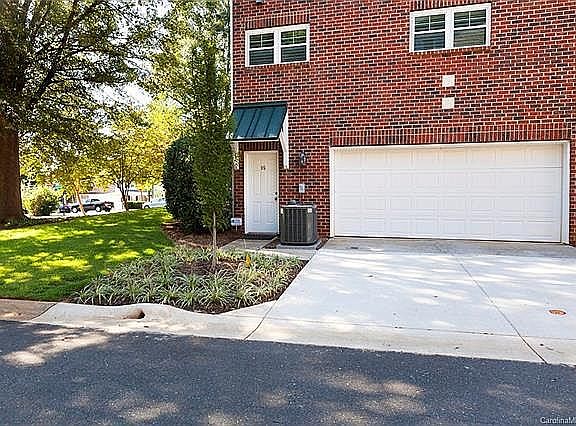 Exterior with 2-Car Garage