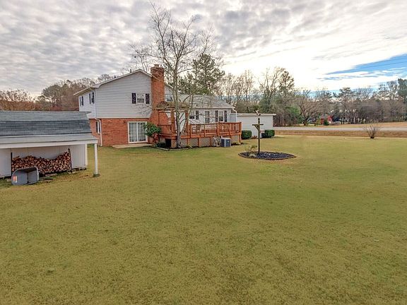 Storage Shed w/ Covered Lean-to