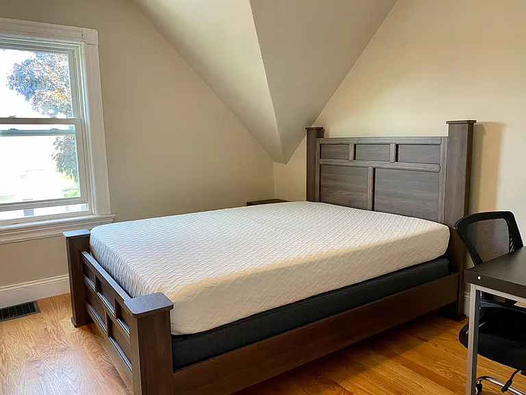 Bedroom 2 w Queen bed, side table, dresser