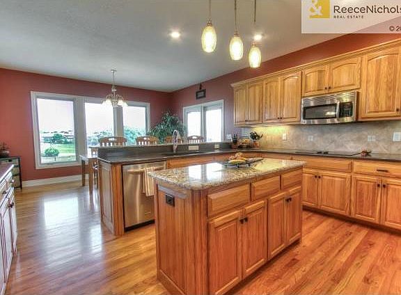 Spacious kitchen with island and breakfast bar