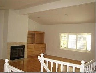 OPEN LIVING AREA WITH FIREPLACE