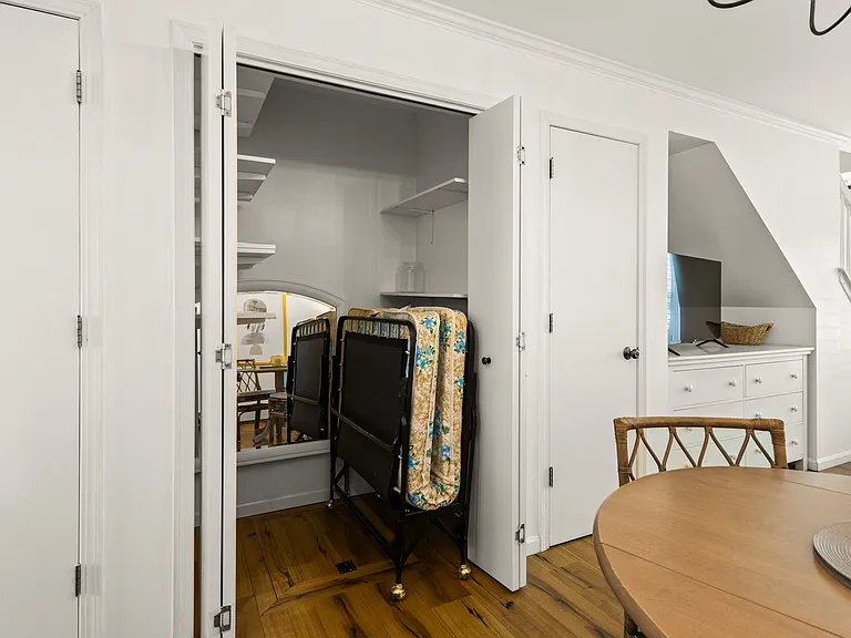 Under-Stairs Storage Closet | Rollaway Beds