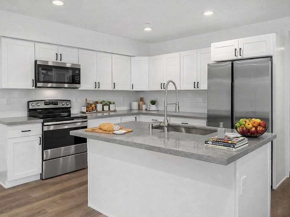 Kitchen comes furnished with barstools, pots, pans, cups, glasses, plated, utensils, small appliances, etc.