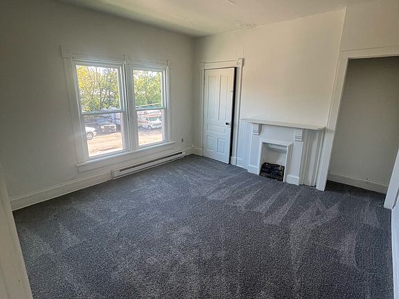 Main-level bedroom with closet space great for easy access or home office.