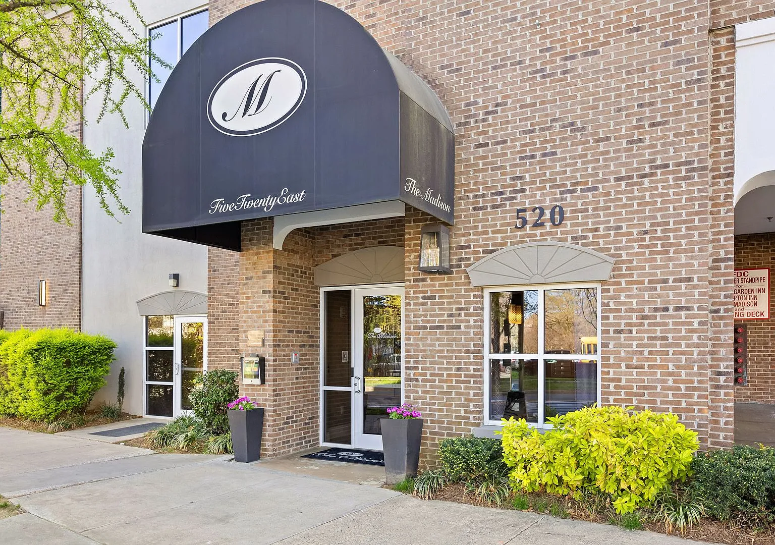 One of just 26 luxury residences in the exclusive uptown condo complex known as The Madison. — Photo 1