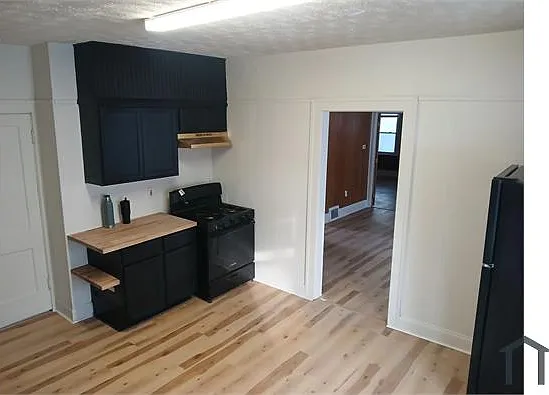 3442 W 58th St #UPPER — Photo 1