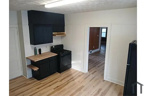 3442 W 58th St #UPPER Photo 1