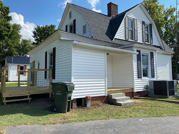This is the back side of the home. This home has a very spacious backyard. Also a large shed that comes with this rental.