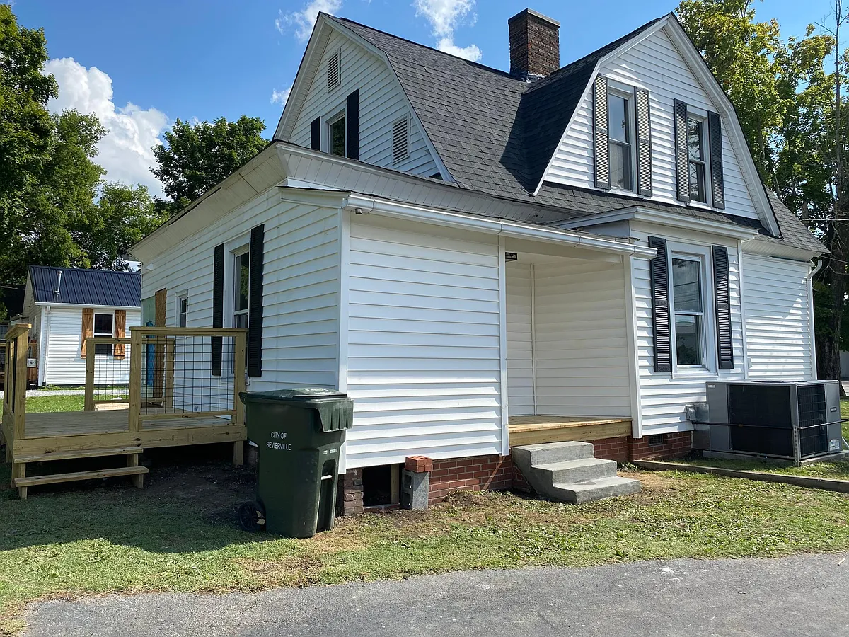 This is the back side of the home. This home has a very spacious backyard. Also a large shed that comes with this rental. - 416 Park Rd