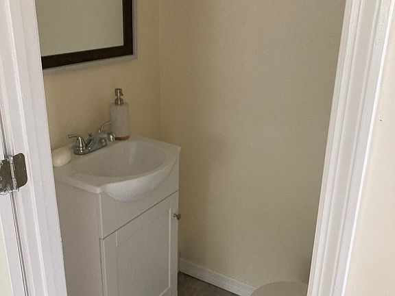 Brand new half bath off the living room.