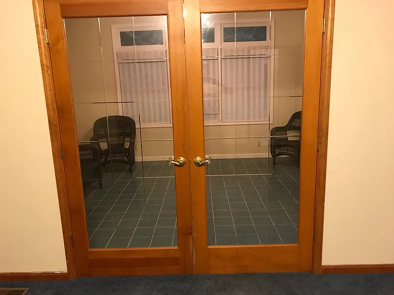 Room off the Family Room leading to pool/ deck/patio area