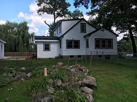 Back side of house view from the ornamental rock stream