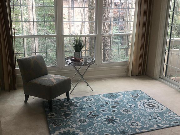 Light filled sunroom leading to deck!