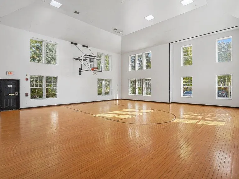 Shoot hoops and stay active year-round on the community's indoor basketball court.