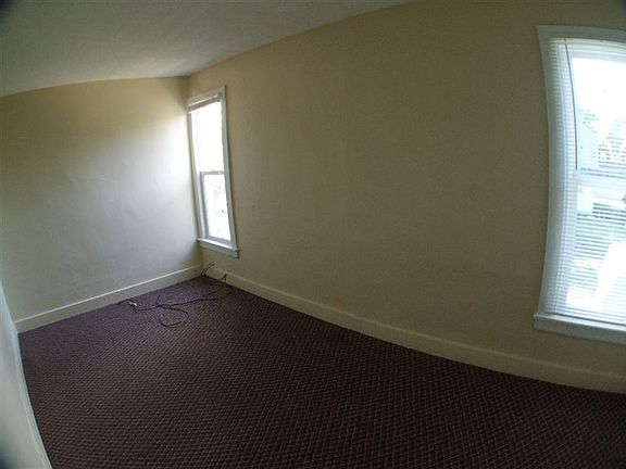 upstairs bedroom towards back of home