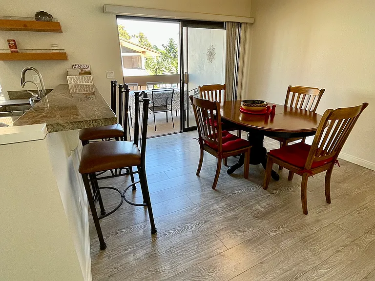 dining area that opens to deck