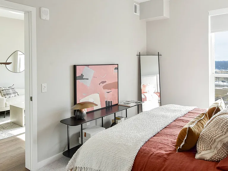 Our inviting bedroom sanctuary at The Hallon luxury apartments in Hopkins, MN