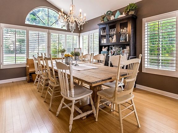 Large dining room looks out to backyard