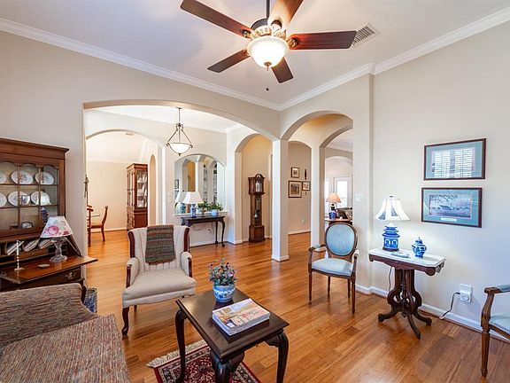 Living room view towards the foyer.