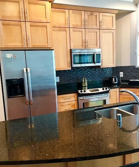 Too of the line cabinetry. Appliances included.