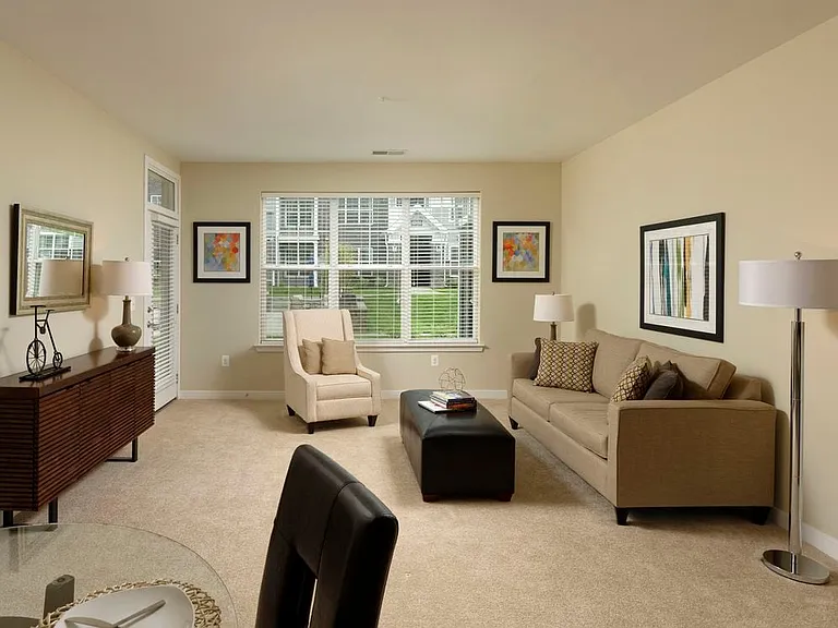 Living area with carpeted flooring