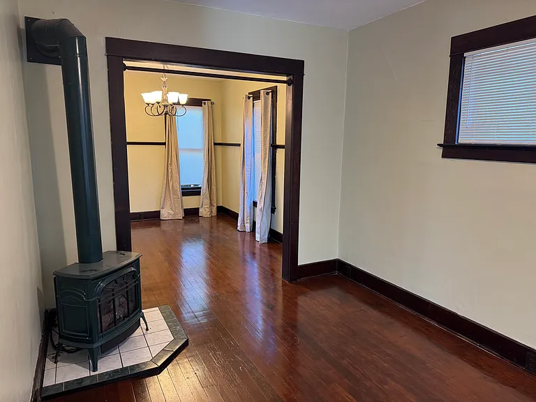 Lots of options for heating the home. This gas fireplace in the front room puts out a lot of heat, or you can use the electric heaters.