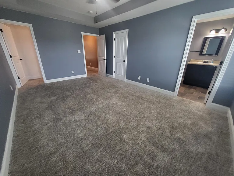 Master bedroom has double closets and en suite full bathroom.