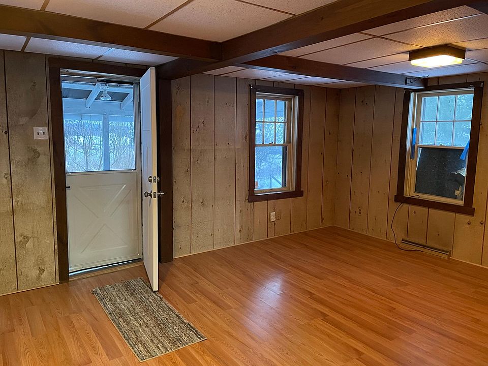 Partial view of living room with front door