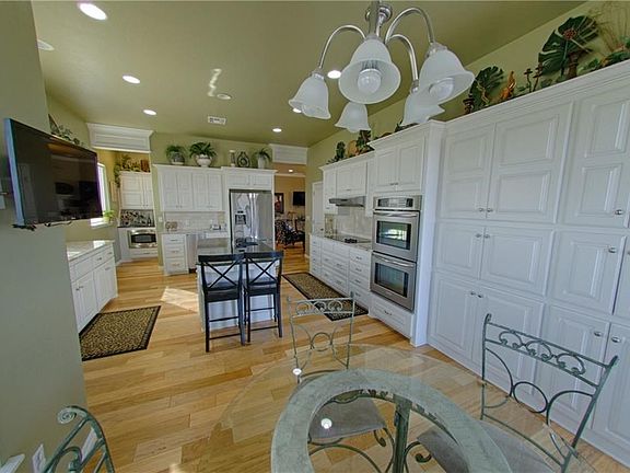 Abundant storage adds to the masterfully designed kitchen