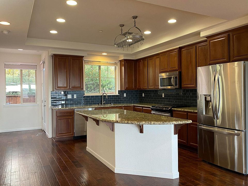 Kitchen with large island and high-end stainless steel appliances