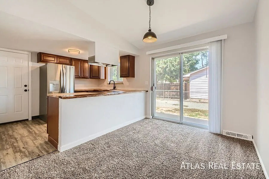 Coming Soon! Spacious 3bd/2ba Aurora Home with A/C and 3-Car Garage — Photo 3