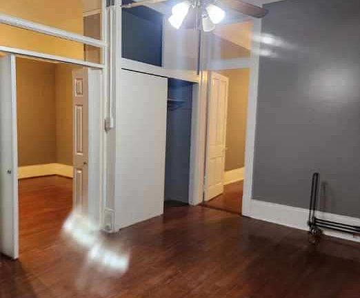 Bedroom 1. Bifold doors are to the living dining room. Large closet. Door connecting to Bedroom 2 if you elect to leave the door open.