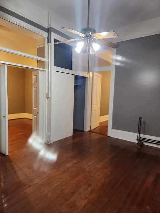 Bedroom 1. Bifold doors are to the living dining room. Large closet. Door connecting to Bedroom 2 if you elect to leave the door open.