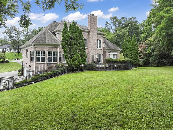 Large fenced-in back yard. Great for pets to roam.