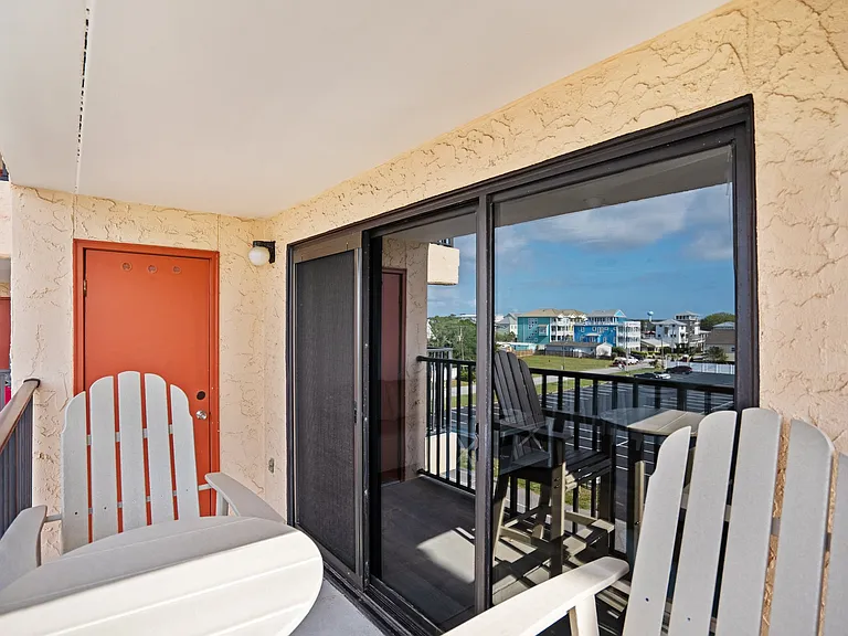 Balcony with 3 panel window/slider and storage closet