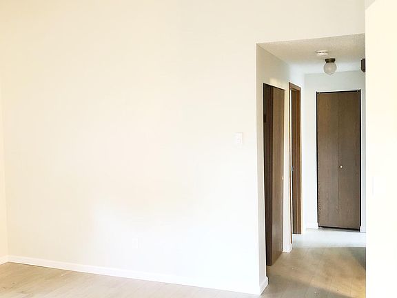 Vaulted living area.. new floors..paint.. heating!