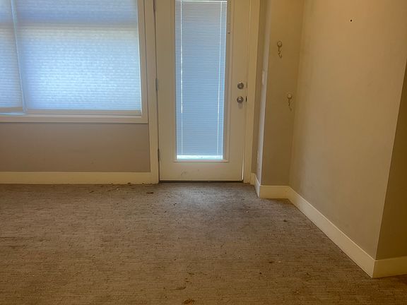 Living room looking to the front door.