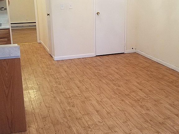 Living room with closet on the right