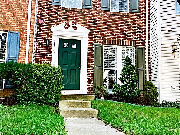 Stunning brick facade and easily maintained front yard