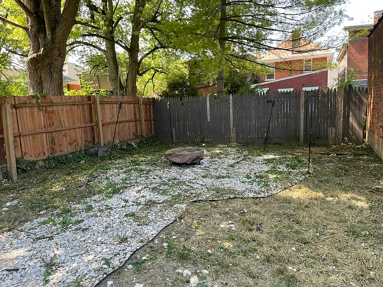 Private backyard with firepit.