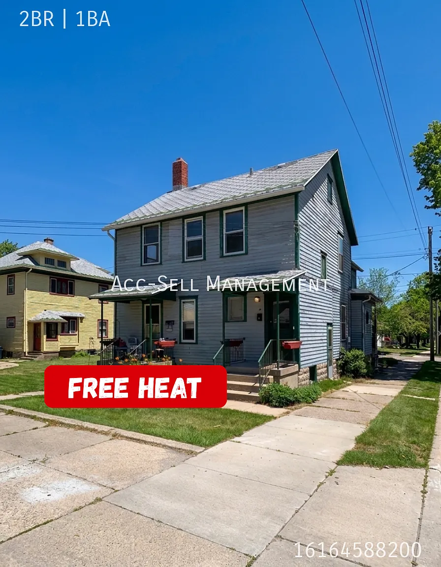 Beautiful 2BR/1BA Upper Apartment at 205 Valley NW #4, Grand Rapids, MI 49504 — Photo 1