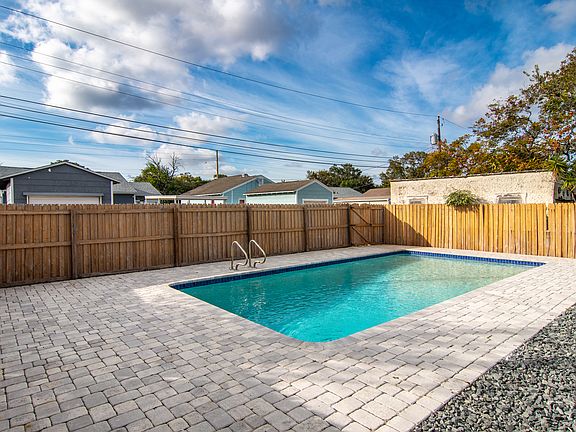 Fenced in pool and patio