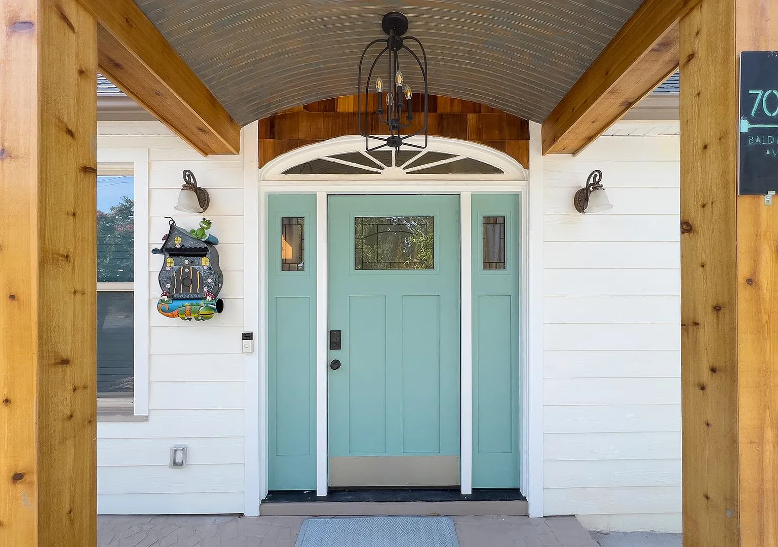 Discover the charm of this top-floor unit in a beautifully updated single-family bungalow — Photo 3