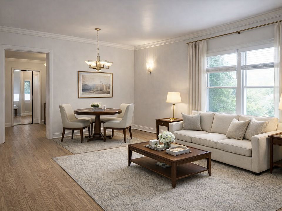 Apartment Living Room - this image is for inspiration purposes only, and has been staged with AI. The apartment is unfurnished.