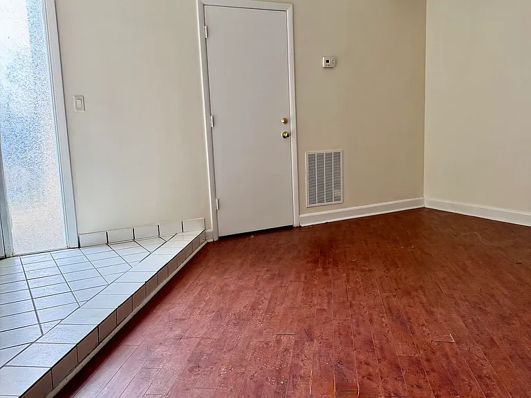 main room, main entry on left, door to half-bath and laundry room. great natural light!