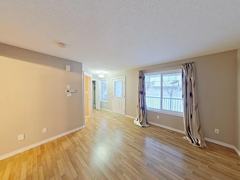 7665 Schmid Cres NW — Photo 3