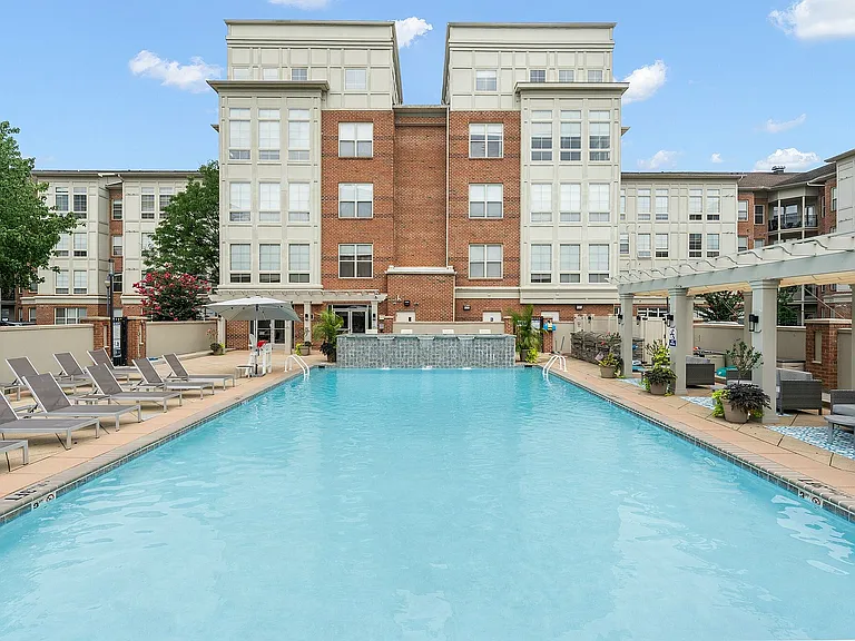Experience luxury and relaxation by the spacious pool in our premier apartment community.